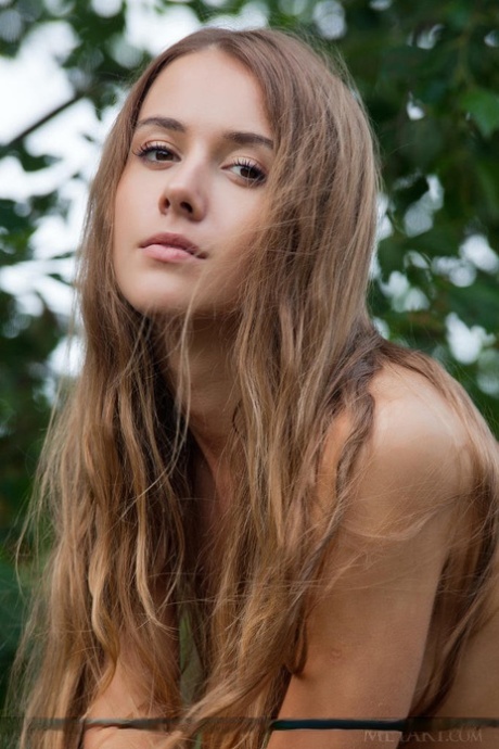Skinny teen model Lina Diamond removes shorts to pose naked on picnic table 79058731