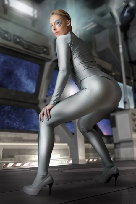 Cosplay enthusiast works her female body parts free of futuristic clothing 74585769
