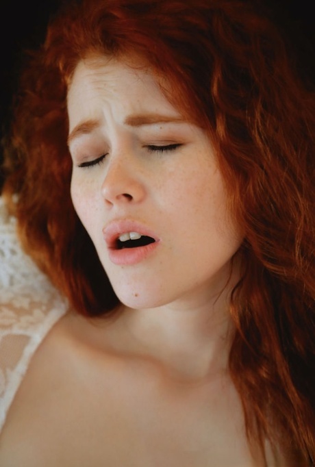 Natural redhead Adel C fingers her pink pussy in white robe 68316701