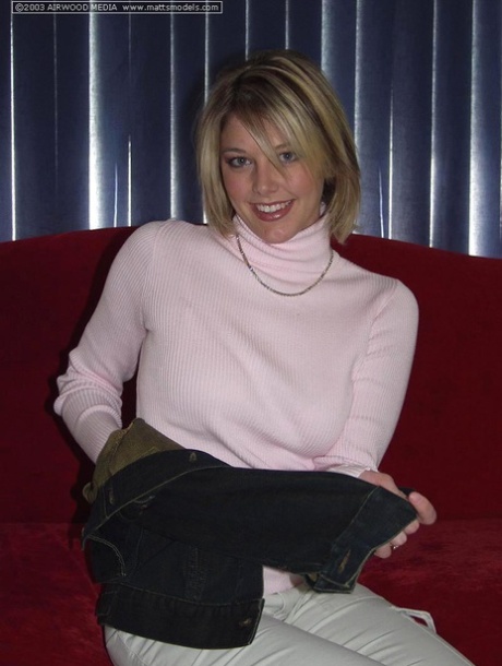 Blonde amateur Kyra takes off her sweater prior to showcasing her bald pussy 62298295