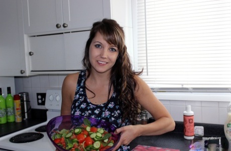 Nice teen Andi Land takes a cucumber to her pussy after fixing a salad 83709836