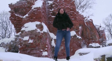 Dark-haired girl Dasha takes a badly needed piss on snowy ground 15988746