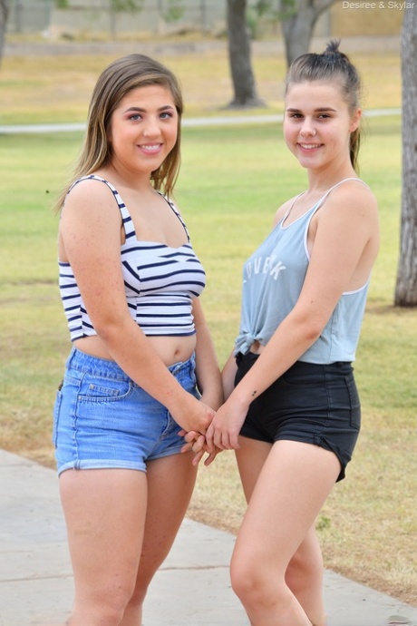 Young amateurs Desiree & Skylar undress before lesbian sex on a rooftop patio 13354817