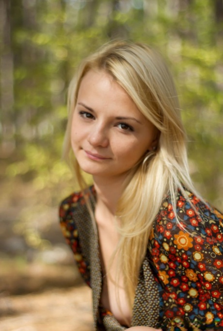 Young blonde Sallustia K gets naked up against a tree while in a forest 36019306
