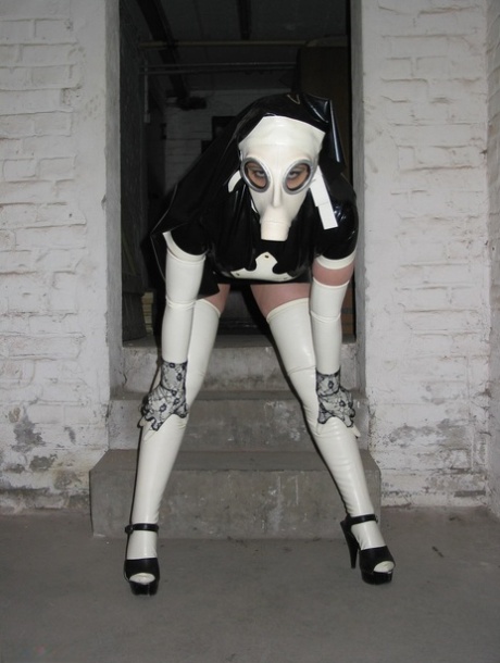 Solo model Avengelique sports a gas mask while wearing latex Nun clothing 24214851