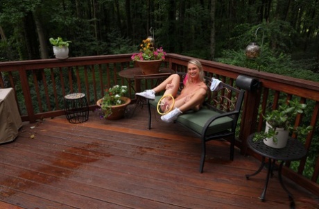 Blonde teen Payton Avery pisses on a deck after a vaginal insertion 12998777