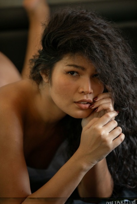 Alluring Thai teen Kathai does away with her lingerie to pose totally naked 65004706