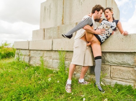 Fully clothed Holly D gets a mouthful giving James Deena blowjob outdoors 75459746