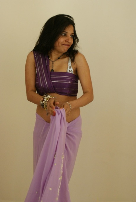 Indian solo girl Kavya unleashes her natural breasts upon her bed 82174751