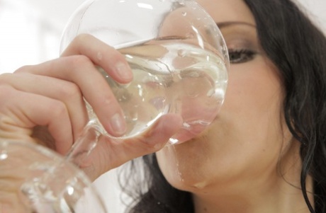 Gitti is pissing in the wineglass and drinking her yellow nectar 47271758