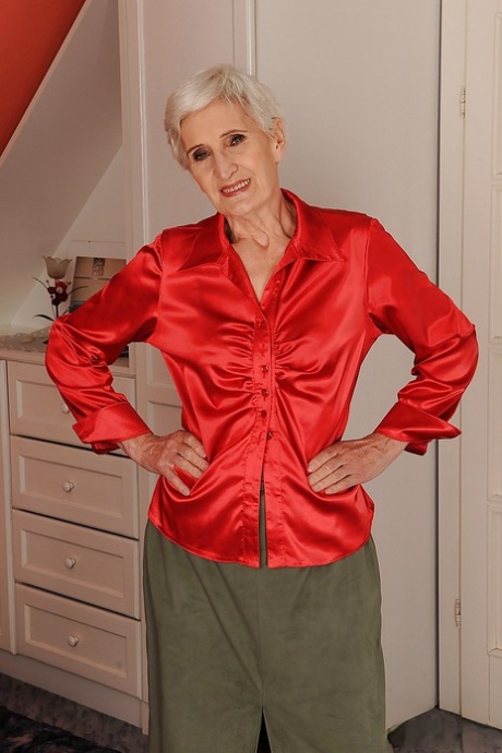 Well toned granny in nylon stockings slipping off her clothes 40834274