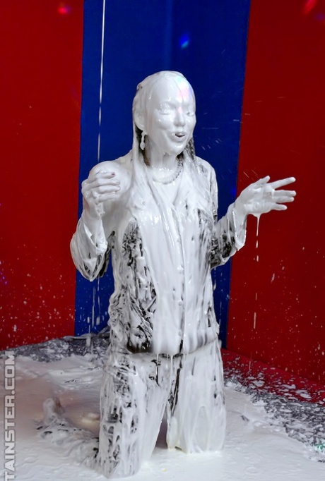 Pretty fully clothed fetish lady having some wet and messy fun 58767252